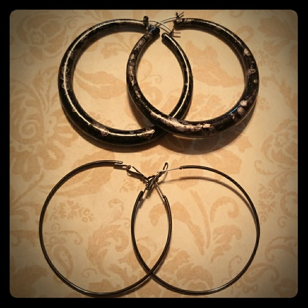Two pairs of black hoop earrings